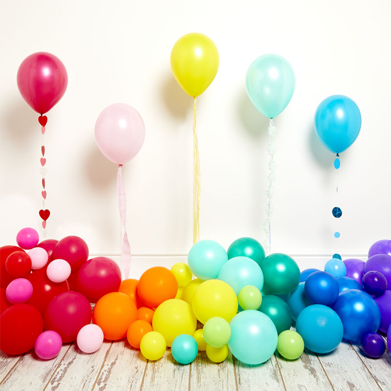 A styled display of colourful party balloons.
